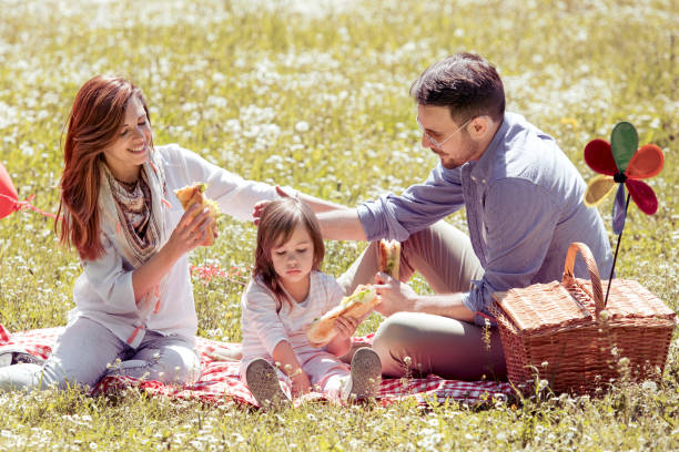 istock Family having fun in park 917263096