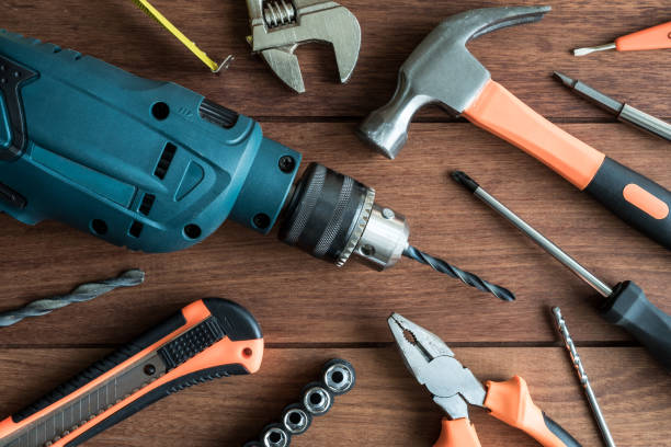 istock Set of work tools on wooden background 917270080
