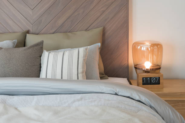 istock set of pillows on bed with wooden wall 917273574