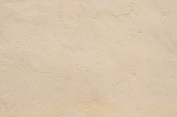 istock Texture Beige dyed cemented wall, softly lined. Exterior texture exterior wall of external walls 917282982