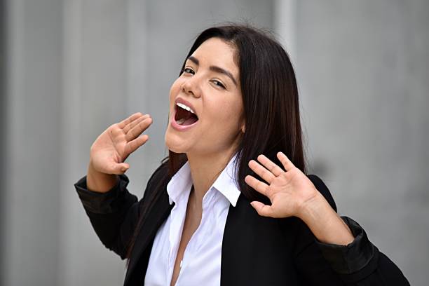 istock Business Woman Singing Wearing Suit 917283872