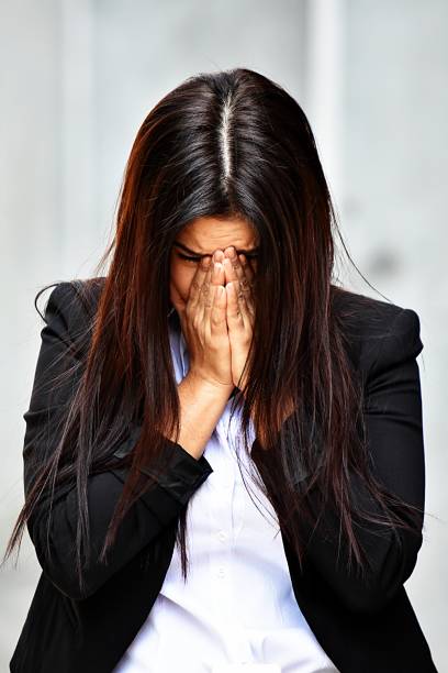 istock Depressed Smart Business Woman Wearing Suit 917283892