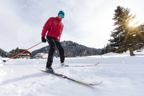 istock Man cross-country skiing during sunny winter day 917291348