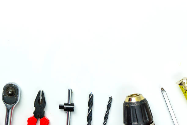 istock Set of construction tools on white background as wrench, hammer, pliers, socket wrench, spanner, tape measure, electric drill,safety glasses, screwdriver. 917299484