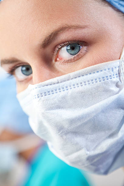 istock Female Doctor In Surgical Mask 91730208