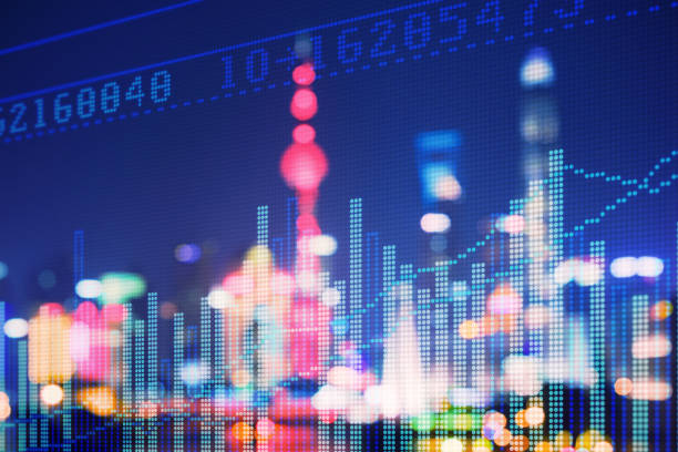 istock Double explosure with businesss charts and financial district of 917311020