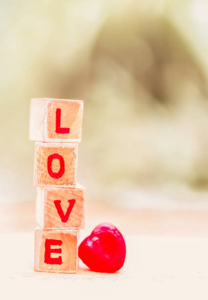 istock Love message written in wooden blocks. 917316600