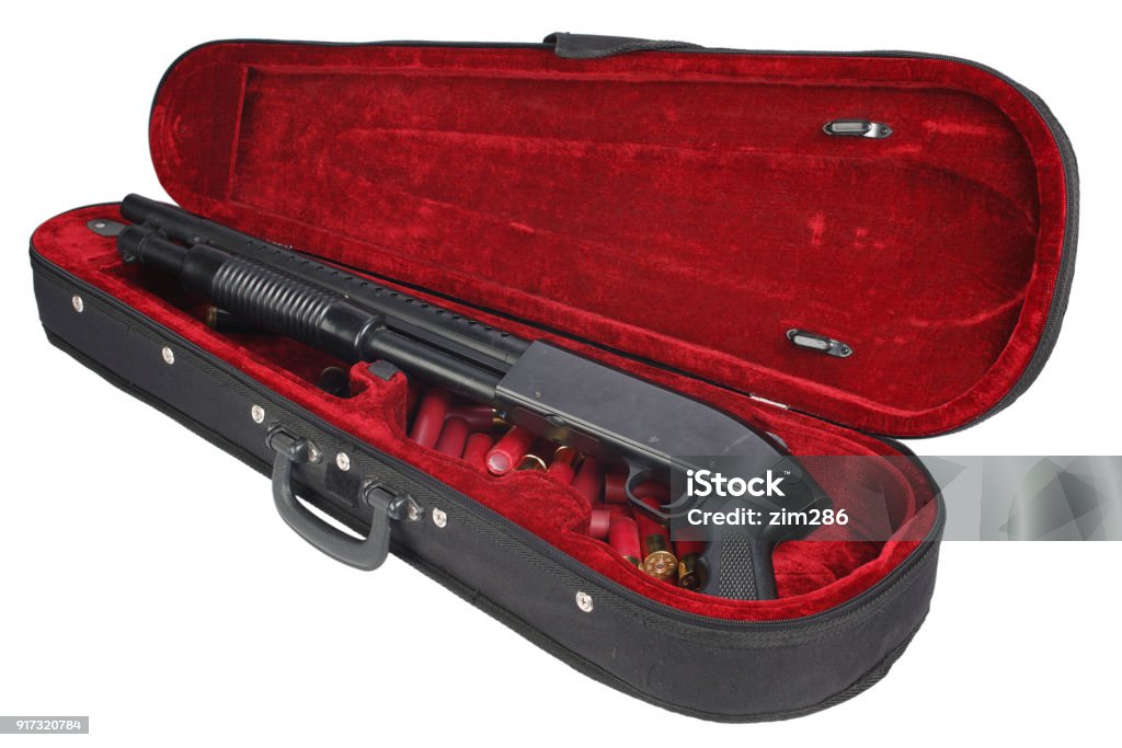 Sawn-off shotgun with cartridges in violin case Violin Stock Photo