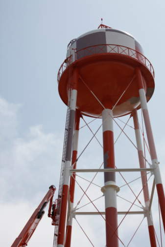 Workmen converged on the water tank in Camarillo, CA, for a much needed paint job. The tank was originally on  the site of the Camarillo AFB long since departed and now part of a local airport and manufacturing area.