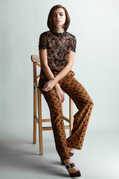 istock vintage fashion female model on studio background 917325048