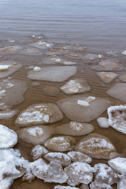 istock Frozen ice crystals on the sea beach 917325634