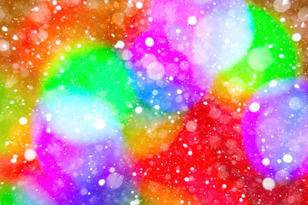 Abstract background of colorful spots, bokeh and snow