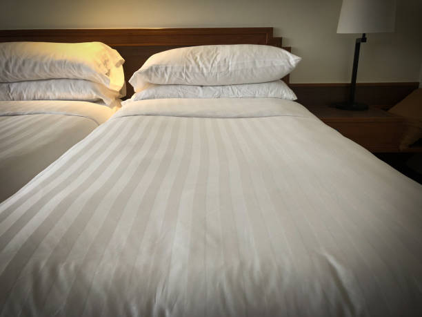 istock Empty twin bed in bedroom hotel 917331440