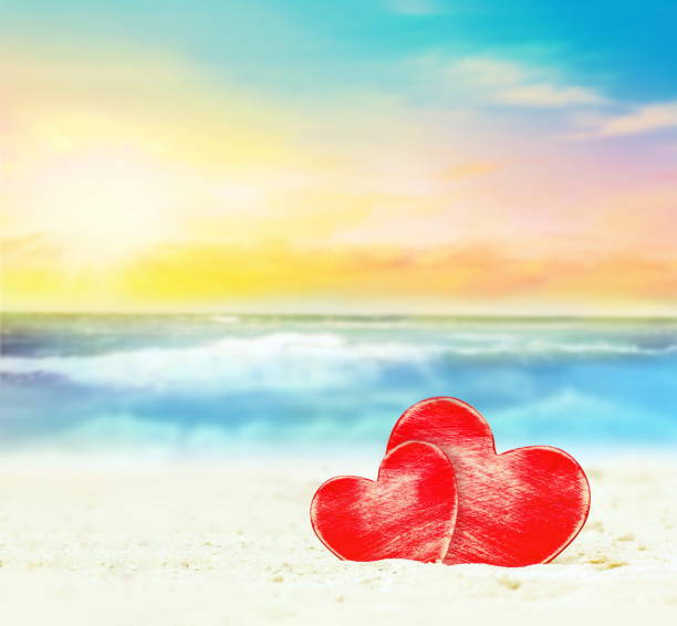 istock Two hearts on the summer beach 917333770