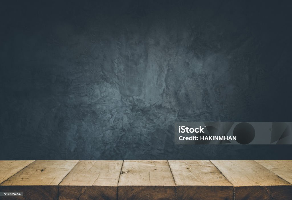 Empty table top with cement wall background. Empty table top with cement wall background.For create product display or design key visual layout Table Stock Photo
