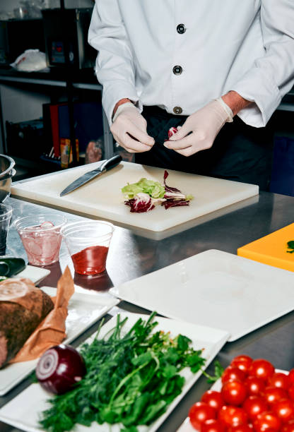 istock meat with vegetables and herbs on the cook's table 917340290