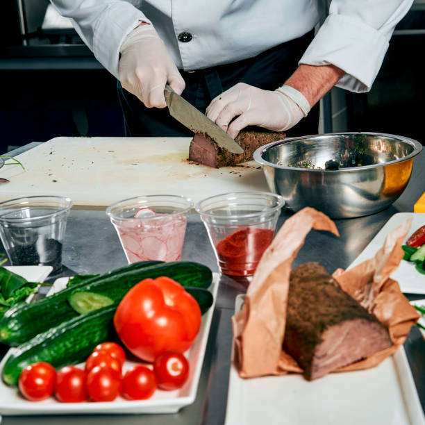 istock meat with vegetables and herbs on the cook's table 917340374