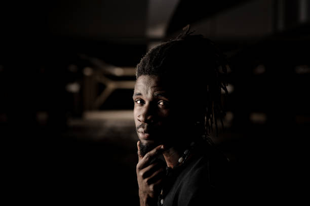 istock Close up portrait of black skinned man 917340476