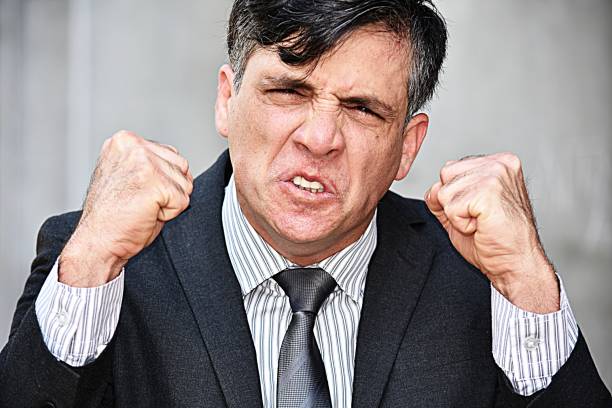 istock Angry Smart Business Man Wearing Suit And Tie 917340820