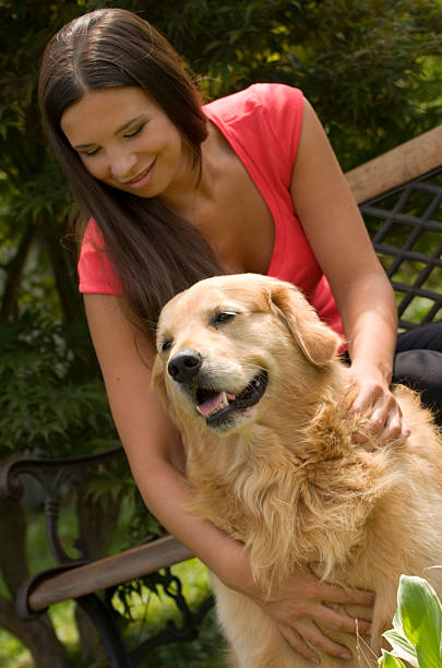 istock Girl with golden retriever 91734234