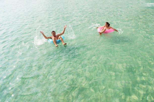 istock Senior couple enjoy sea water 917342930