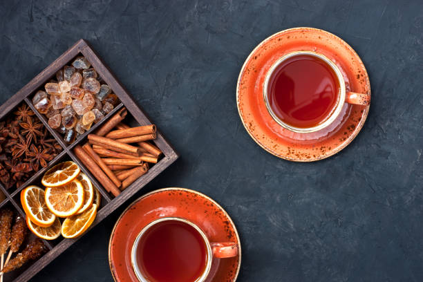 istock Tea cup and wooden box  with  winter spices 917347958