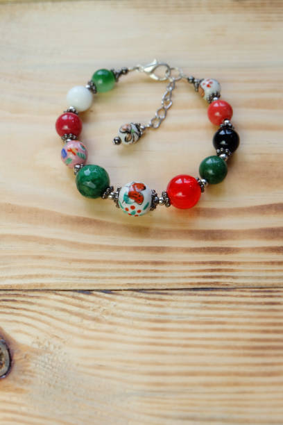 istock Bracelet on a wooden table 917352108