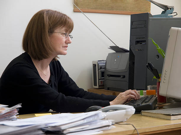 istock Middle aged woman working in the office 91735735