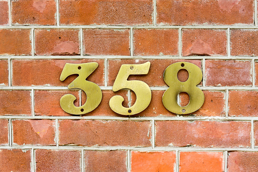 Brass house number three hundred and fifty eight (358)