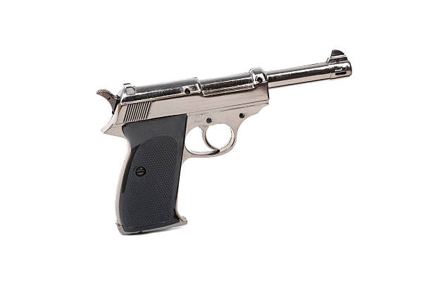 istock Closeup of pistol isolated on a white 91735990