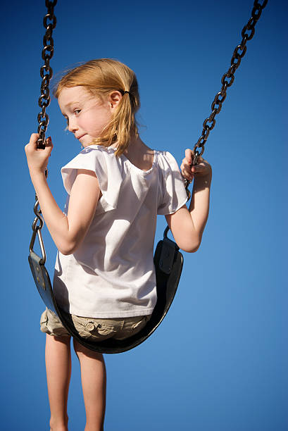 istock Red Head Girl on Swing 91736405