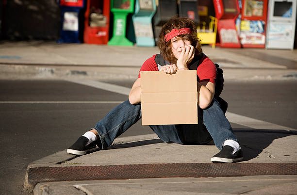 istock Young Man with Blank Cardboard Sign 91736979