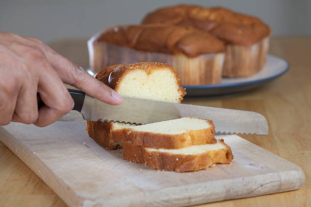 Pound Cake on Cutting Board  serrated stock pictures, royalty-free photos & images