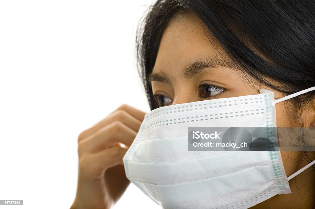 Азиатская женщина, ввод на маска для лица - Стоковые фото Бактерия роялти-фри