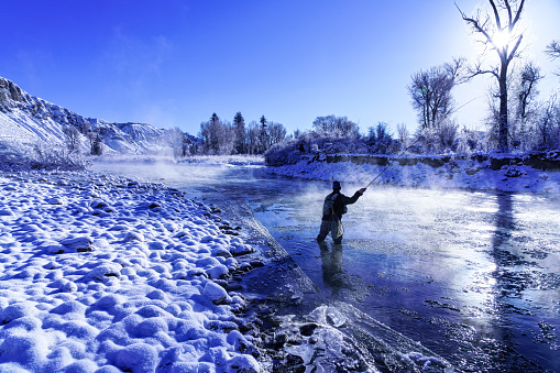 Winter Fly Fishing in Cold Tempereatures - Wading and fishing the Eagle River, Colorado during very cold and frozen condistions and fresh snow.