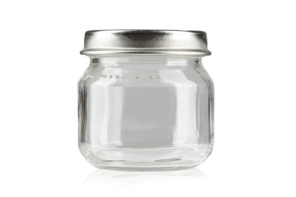 istock empty glass jar for conservation, isolated on white background. 917380022