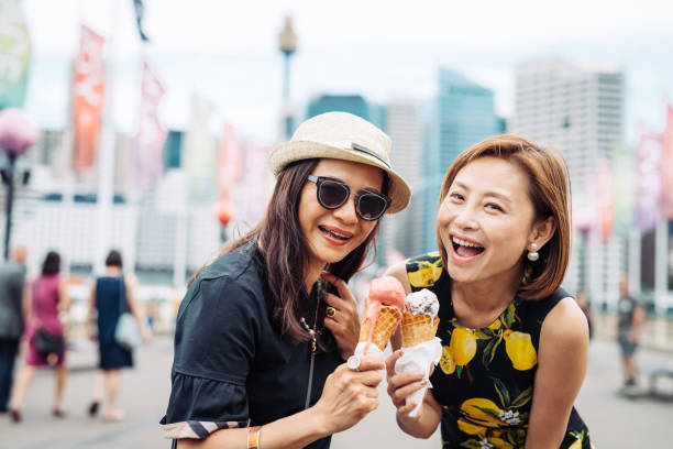 istock Mature Asian women eating ice-cream 917380620