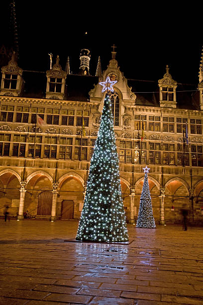 istock Blue christmas trees on the Ypres market 91738163