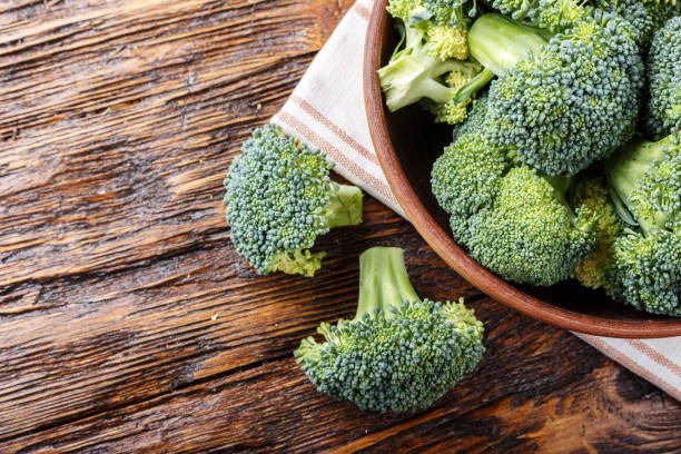 istock broccoli in a clay plate on a wooden table 917382768