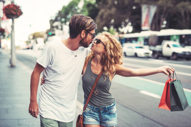 istock Happy couple with shopping bags 917385230