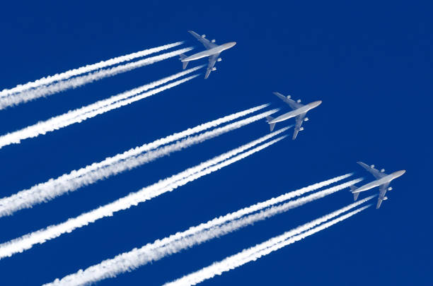 istock Airplane big four engines aviation airport contrail clouds. 917385802