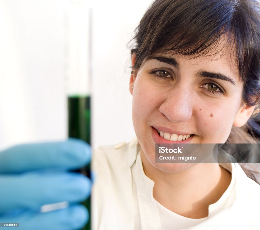 Green Sample Lab Lab Tech Presenting Green Sample Stock Photo - Download Image Now ...