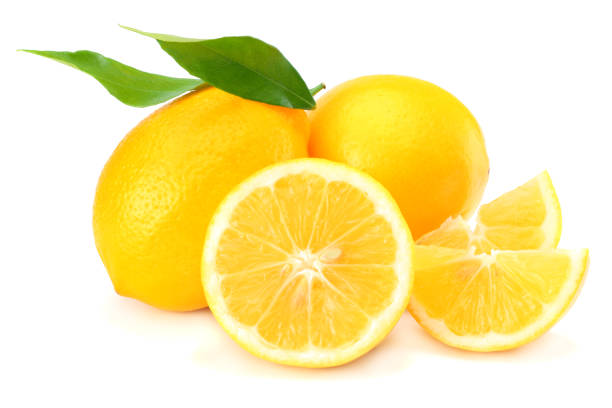 istock healthy food. lemon with green leaf isolated on white background 917390824