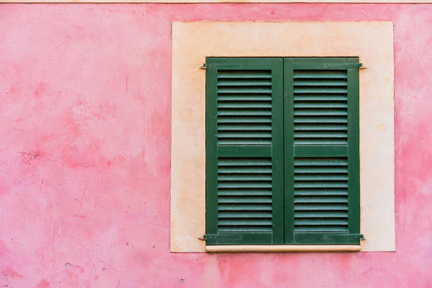 istock Mediterranean house window shutters, close-up 917390948