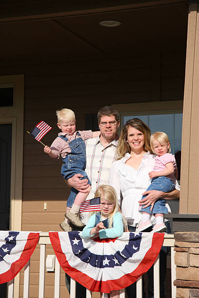 istock Patriotic family on front porch 91739139