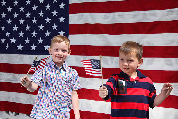 istock Two young boys waving American Flags 91739343