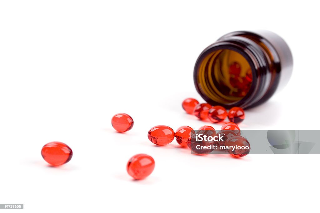 Bottiglia di pillole rosso - Foto stock royalty-free di Antibiotico
