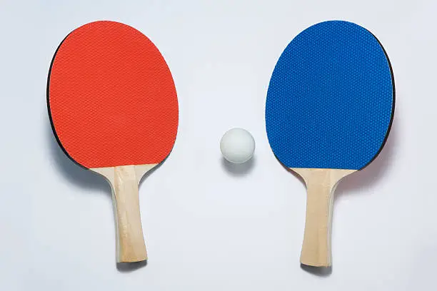 Photo of Tennis paddles and ball