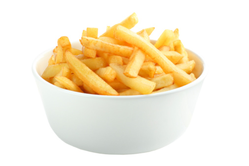 A plate of fries chips topped with parmesan cheese and truffled mayonnaise is a delicious and indulgent snack or side dish.