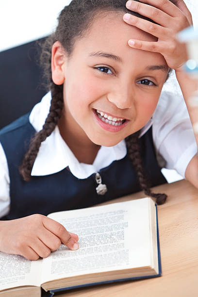 istock Pretty Young School Girl Reading A Book 91741751